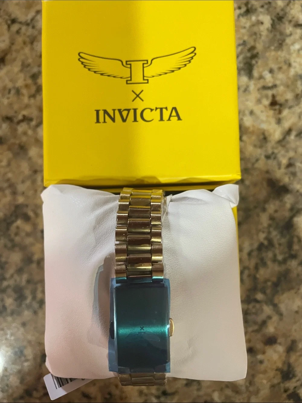 Invicta Men’s Gold Tone Bracelet and Black Dial Watch